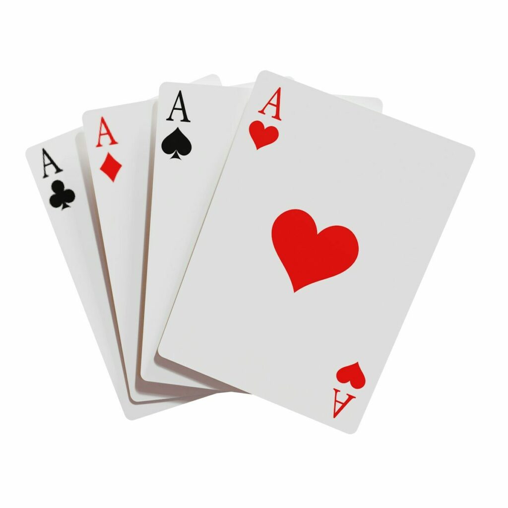 Photo by Eyestetix Studio four of a kind of playing cards with a red heart